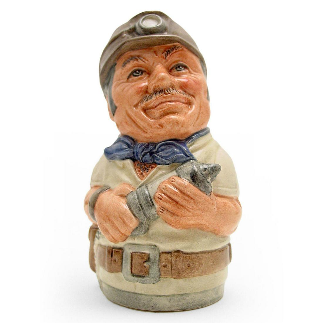 Mike Mineral The Miner D6741 - Royal Doulton Toby Jug: Royal Doulton Toby Jug, Mike Mineral the Miner D6741 (light green shirt; grey helmet; blue scarf; light brown belt). Designed by William K. Harper. Series: The Doultonville Collection, issued 1986 - 1