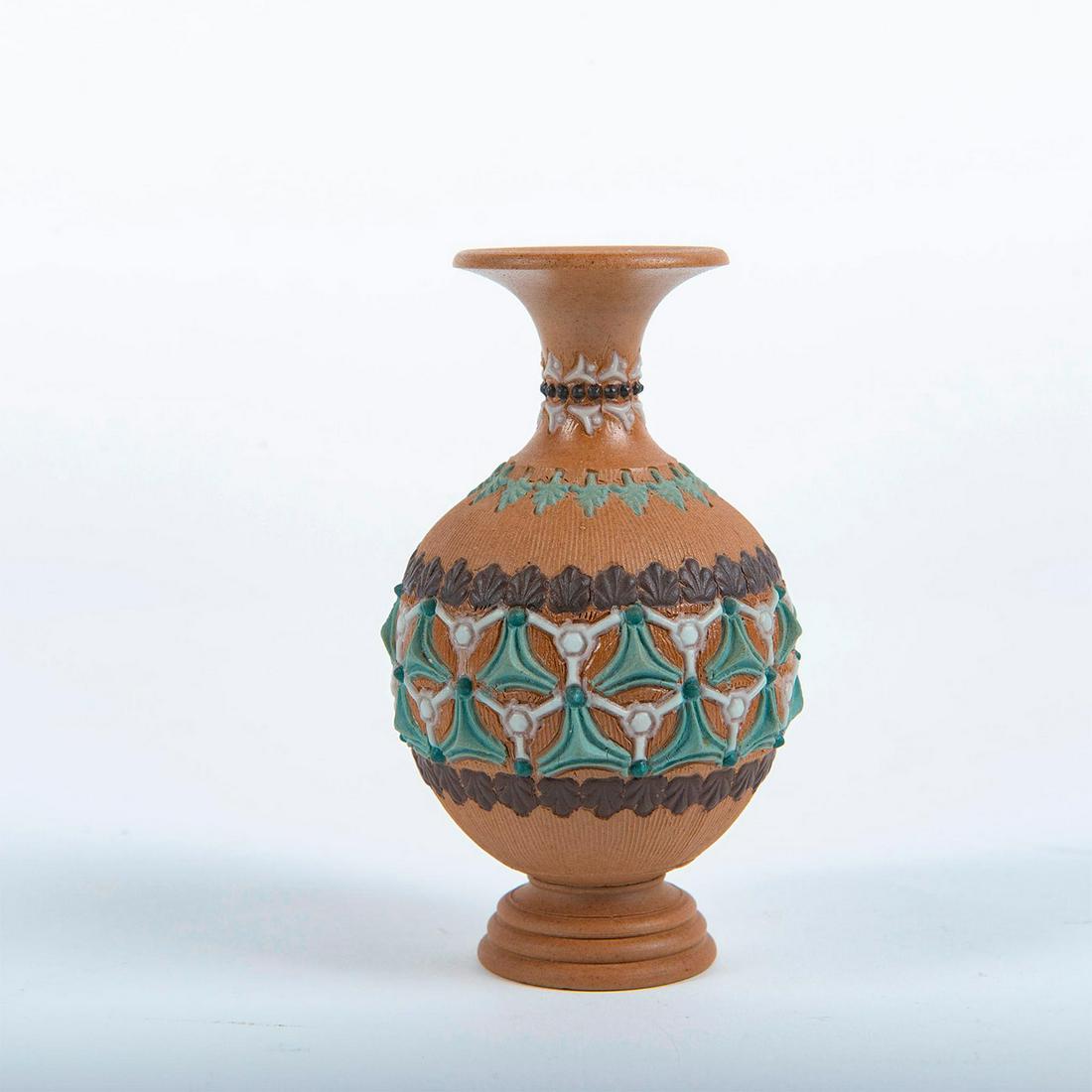 Doulton Lambeth Silicon Ware Small Footed Vase: Brown tone, decorated with applied and hand painted decorations. Doulton Lambeth Silicon Ware mark. Issued: Late 19th c. to early 20th c. Dimensions: 4.5"H Manufacturer: Doulton Lambeth Country of Ori