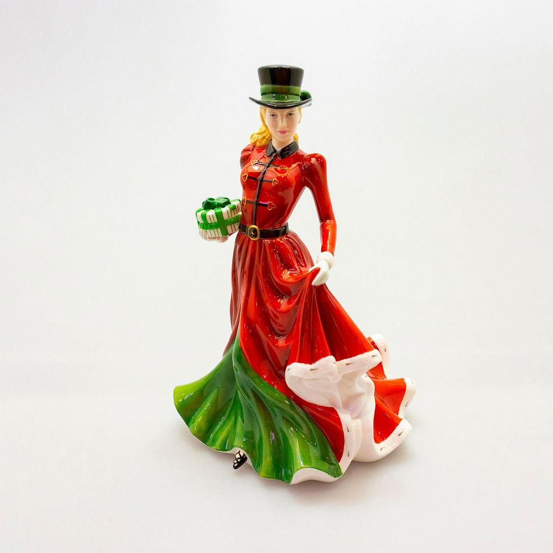 Christmas Day 2006 Hn4899 - Royal Doulton Figurine: Part of the Christmas Day series collection. Royal Doulton backstamp. Bottom base signed by Michael Doulton. Artist: Tom Mason Issued: 2006 Dimensions: 8.75"H Manufacturer: Royal Doulton Country of Or