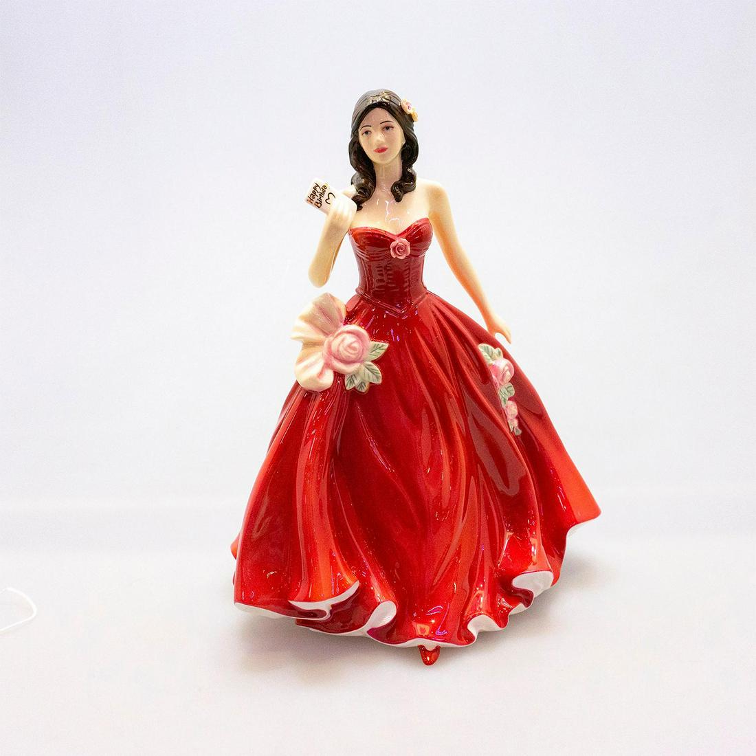 Happy Birthday 2008 Hn5117 - Royal Doulton Figurine: A birthday girl in a bold red evening gown, this young lady is a striking figurine, finely modeled by John Bromley. Artist: John Bromley Issued: 2007 - 2008 Dimensions: 8.5"H Manufacturer: Royal Doult