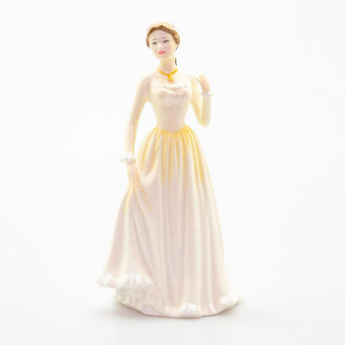 Lisa Hn4525 - Royal Doulton Figurine: Elegant hand-painted Royal Doulton figurine. Artist: Nada Pedley Issued: 2003 - 2004 Dimensions: 8.25"H Manufacturer: Royal Doulton Country of Origin: England