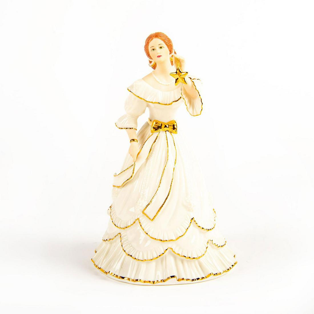 Lenox Fine Porcelain Figurine, Ivory Christmas Gala: 1996 Ivory Classic; limited edition. Ivory colorway; gilt accents; exquisite detail to piece. Lenox backstamp. Issued: 1996 Dimensions: 8"H Manufacturer: Lenox Country of Origin: Malaysia