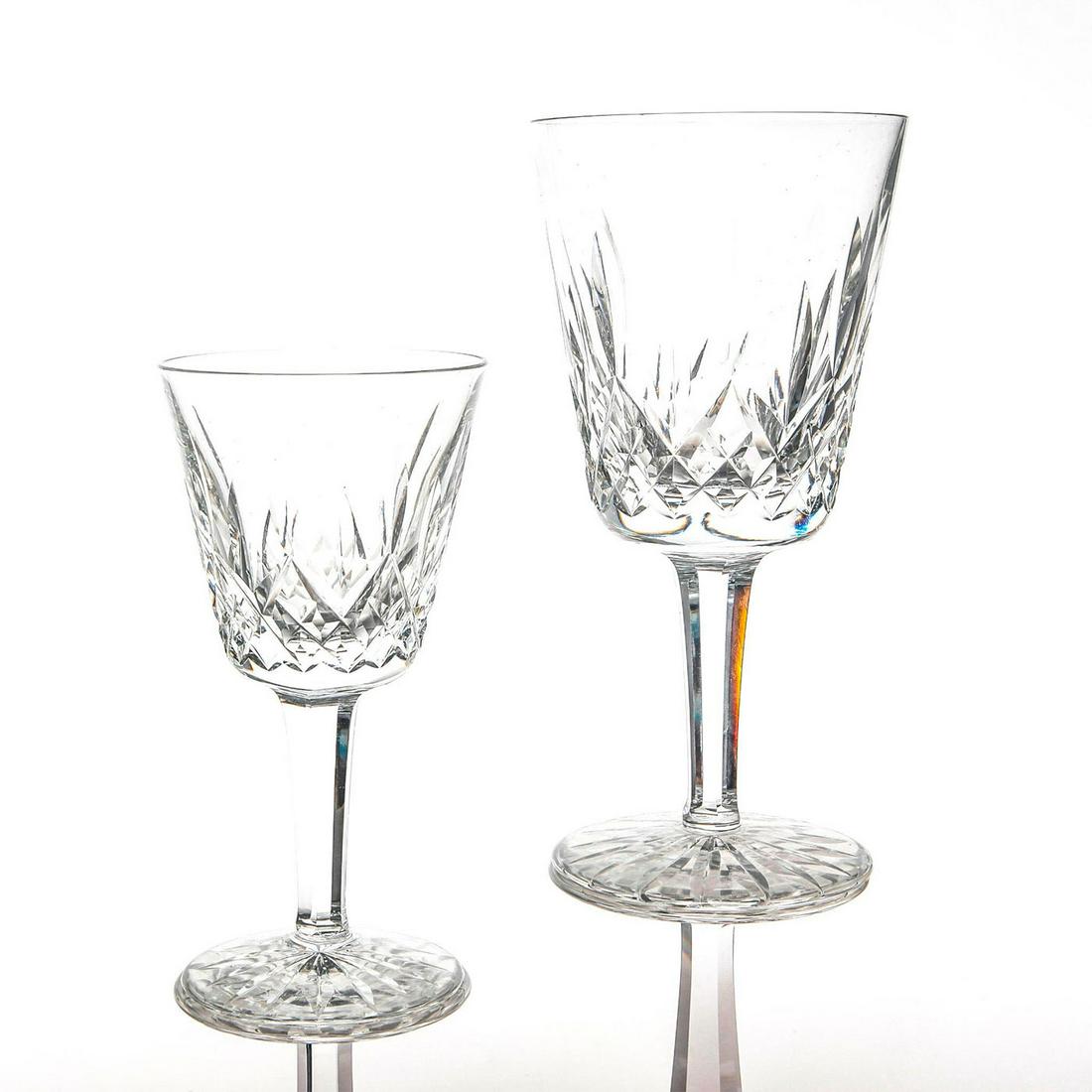 16 Waterford Crystal Lismore Pattern Wine Glasses, 2: Set of 16 wine glasses, 8 tall, 8 short. The taller glasses are 7"H, the shorter glasses are 5.75"H. 