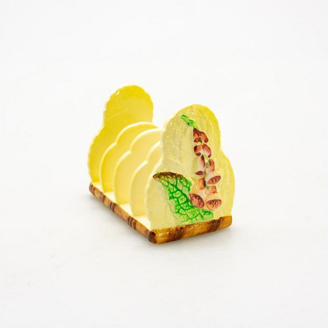 Carlton Ware Vintage Four Slice Ceramic Toast Rack: Raised floral decoration in Foxglove pattern, with green, violet, and caramel brown over a creamy canary yellow. Mid-century decor with CARLTON WARE backstamp and AUSTRALIAN trademark. #CarltonWare #T
