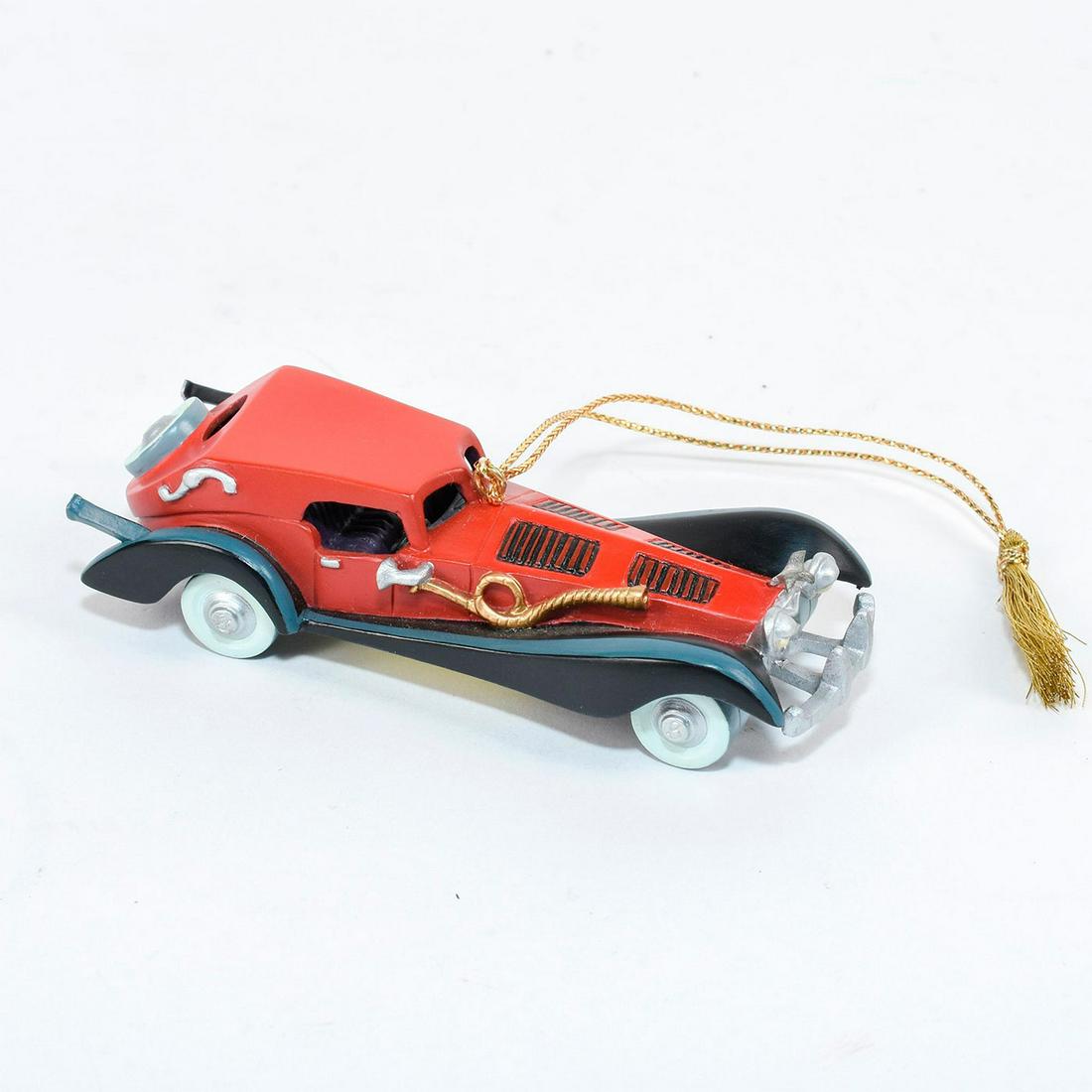Walt Disney Classics Collection Ornament, Cruella's Car: Detailed ornament of Cruella De Vil's roadster sports car. #disney