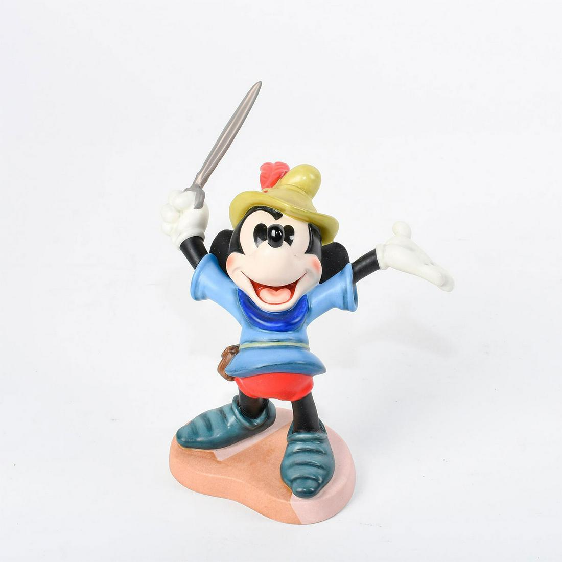 Disney Classics Collection Figurine, Brave Little: Mickey Mouse is seen standing heroically holding his sword. From the Disney film 'Brave Little Tailor'. Quote on the bottom reads "I Let 'em Have It!" 1993 Members Only Sculpture. #disney #mickeymouse