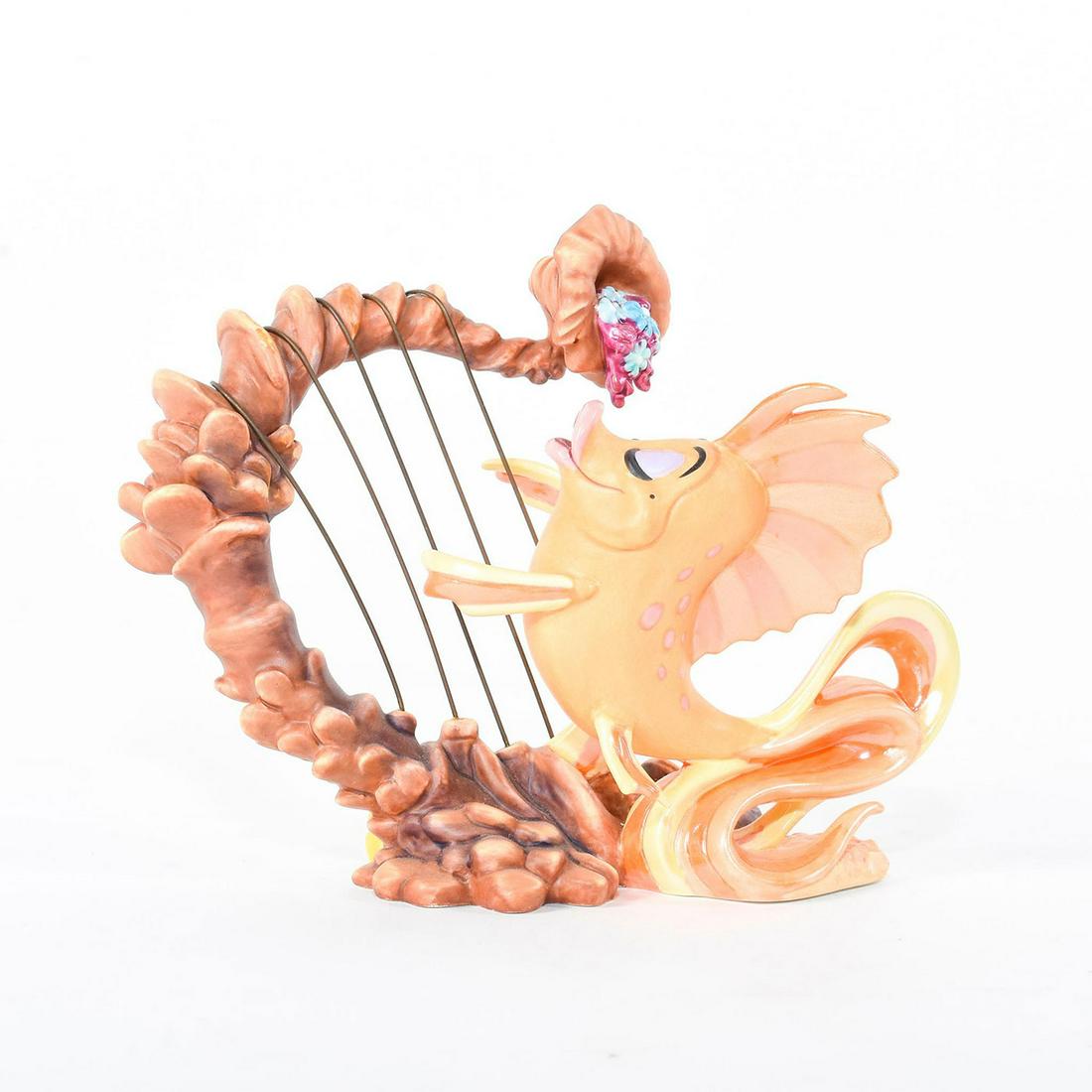 Disney Classics Figurine, Classical Carp, Little: The vibrantly colored carp gleefully plays her harp. Flowers are seen at the top end. The Classical Carp is seen playing her harp in the song 'Under the Sea' in the film 'The Little Mermaid'. #disney 