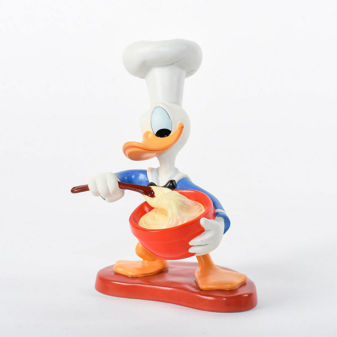 Walt Disney Classics Collection Figurine, Chef Donald: Donald Duck wears his chef hat and is whipping something up in his mixing bowl. Limited edition, 60th Anniversary. Something's Cooking. From the Disney film Chef Donald. #disney #donaldduck