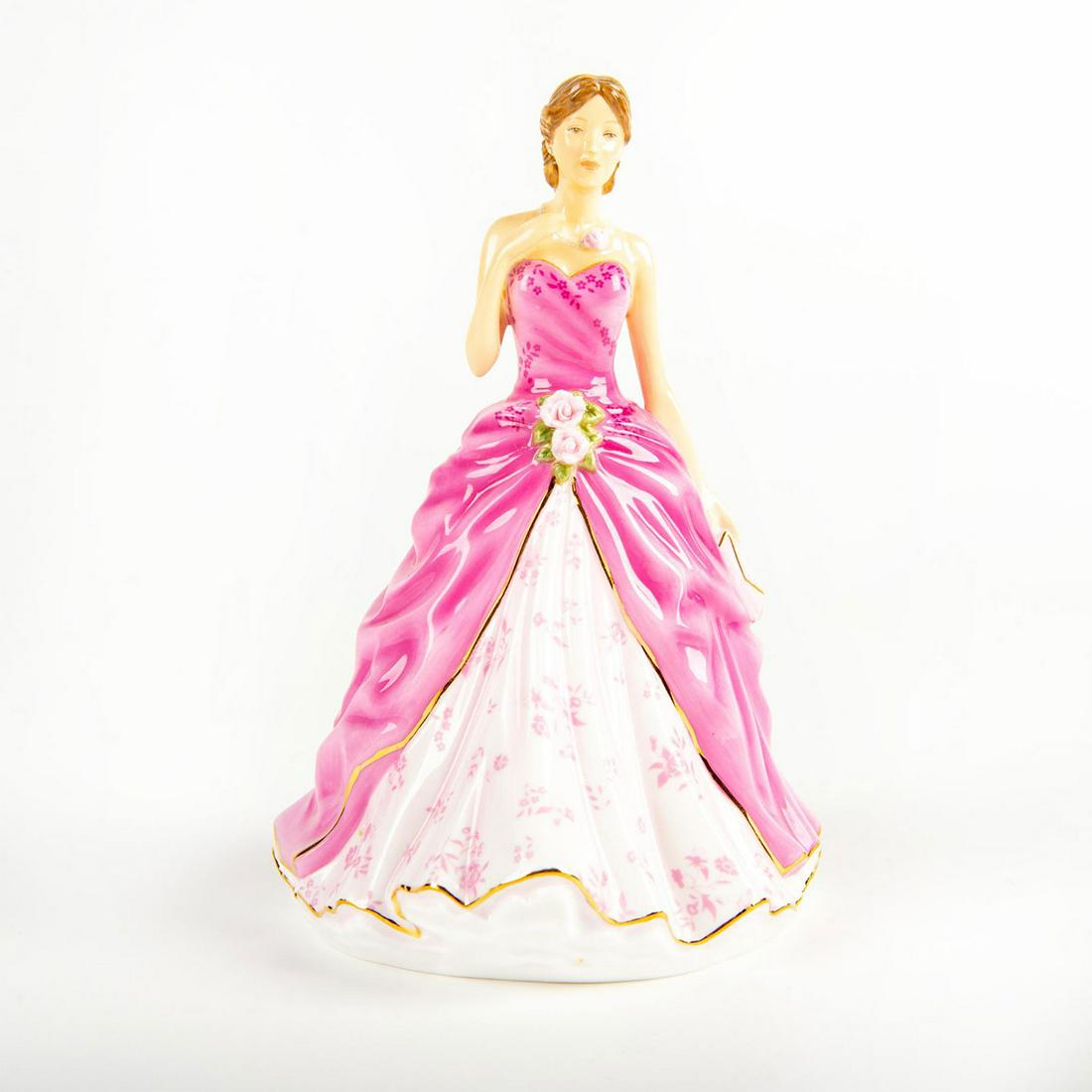 Royal Doulton Lady Figurine, Grace HN5830: Petite Figure of the Year 2017. Pink and white dress; gilt highlights. Marked Royal Doulton on the underside. Artist: Neil Faulkner Issued: 2017 Dimensions: 7.25"H Manufacturer: Royal Doulton Country 