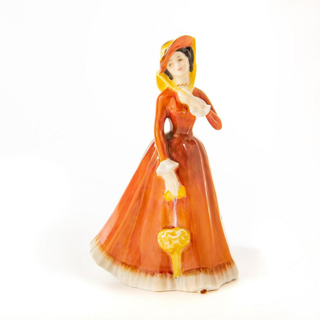 Royal Doulton Figurine, Julia HN2705: Peggy Davies Classics. Hand painted porcelain; orange colorway. Doulton backstamp. Artist: Peggy Davies Issued: 1975 - 1990 Dimensions: 7.75"H Manufacturer: Royal Doulton Country of Origin: England