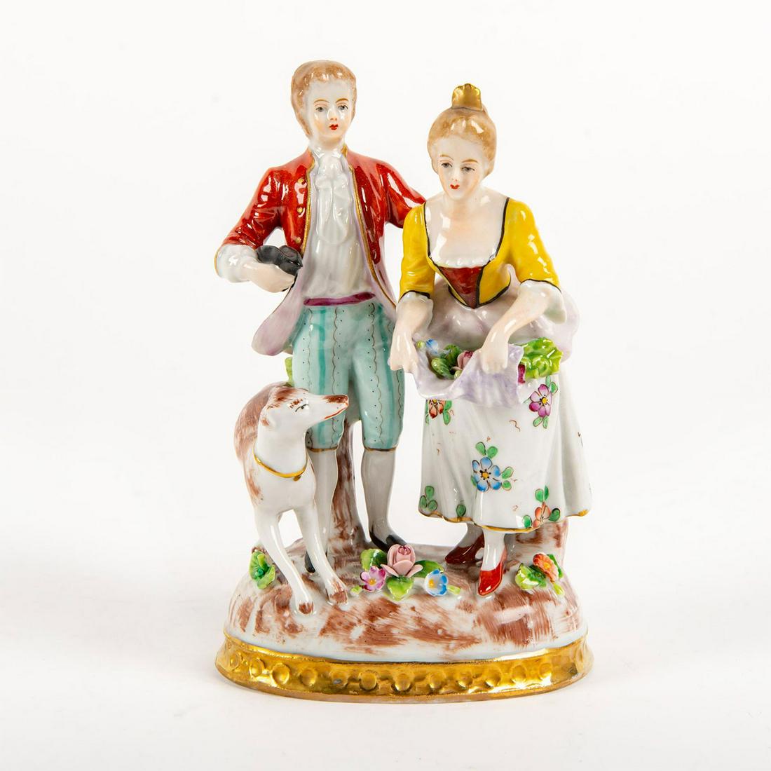 Vintage Sitzendorf Figural Group, Man And Woman With: Hand painted; gilt highlights. Woman carrying flowers; man holding hat; borzoi. Sitzendorf backstamp. Issued: 20th c. Dimensions: 5.75"H Manufacturer: Sitzendorf Country of Origin: Germany