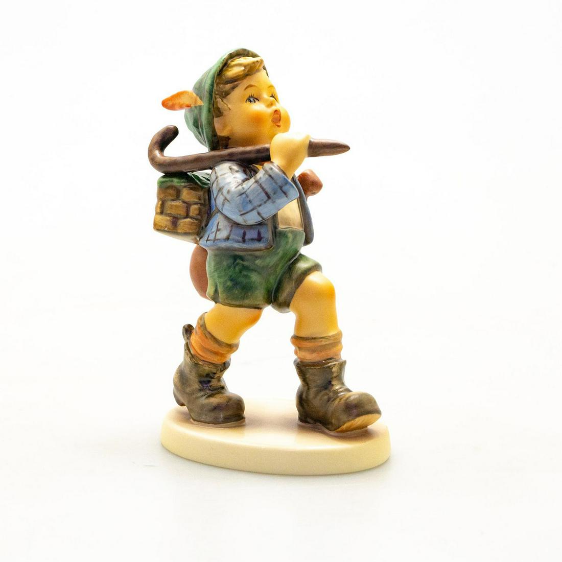 Goebel Hummel Figurine, The Run-A-Way: Hand painted porcelain, matte finish. Impressed M.I. Hummel to round base with title label. Impressed 327, 1972 to bottom base. Goebel backstamp. Marked W. Germany. Artist: M. I. Hummel Issued: 1972 D