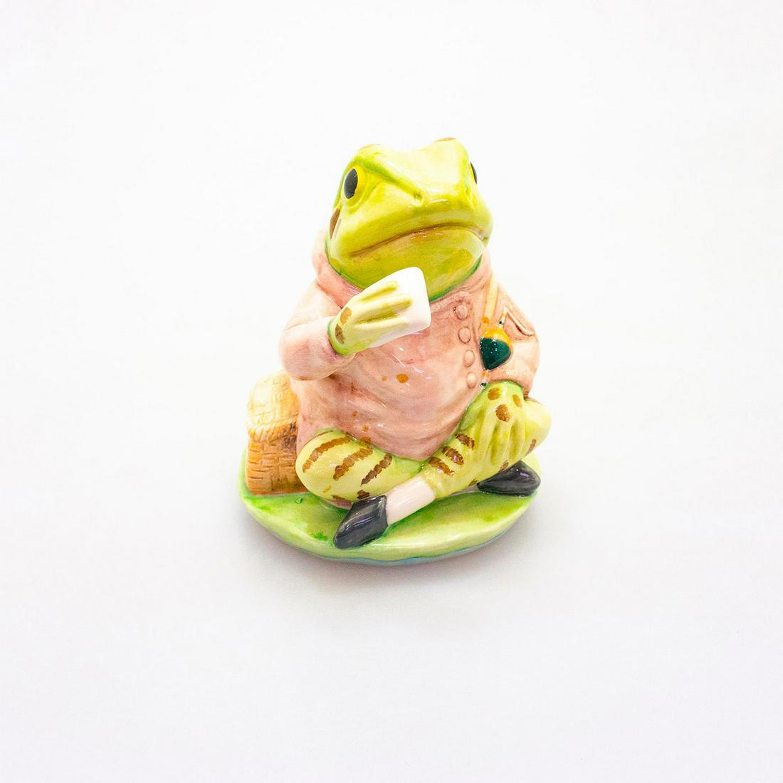 Royal Albert Beatrix Potter Lg Figurine, Jeremy Fisher: Modeled as a green frog fishing. Royal Albert backstamp. Artist: Martyn Alcock Issued: 1994 - 1997 Dimensions: 5"H Manufacturer: Royal Albert Country of Origin: England