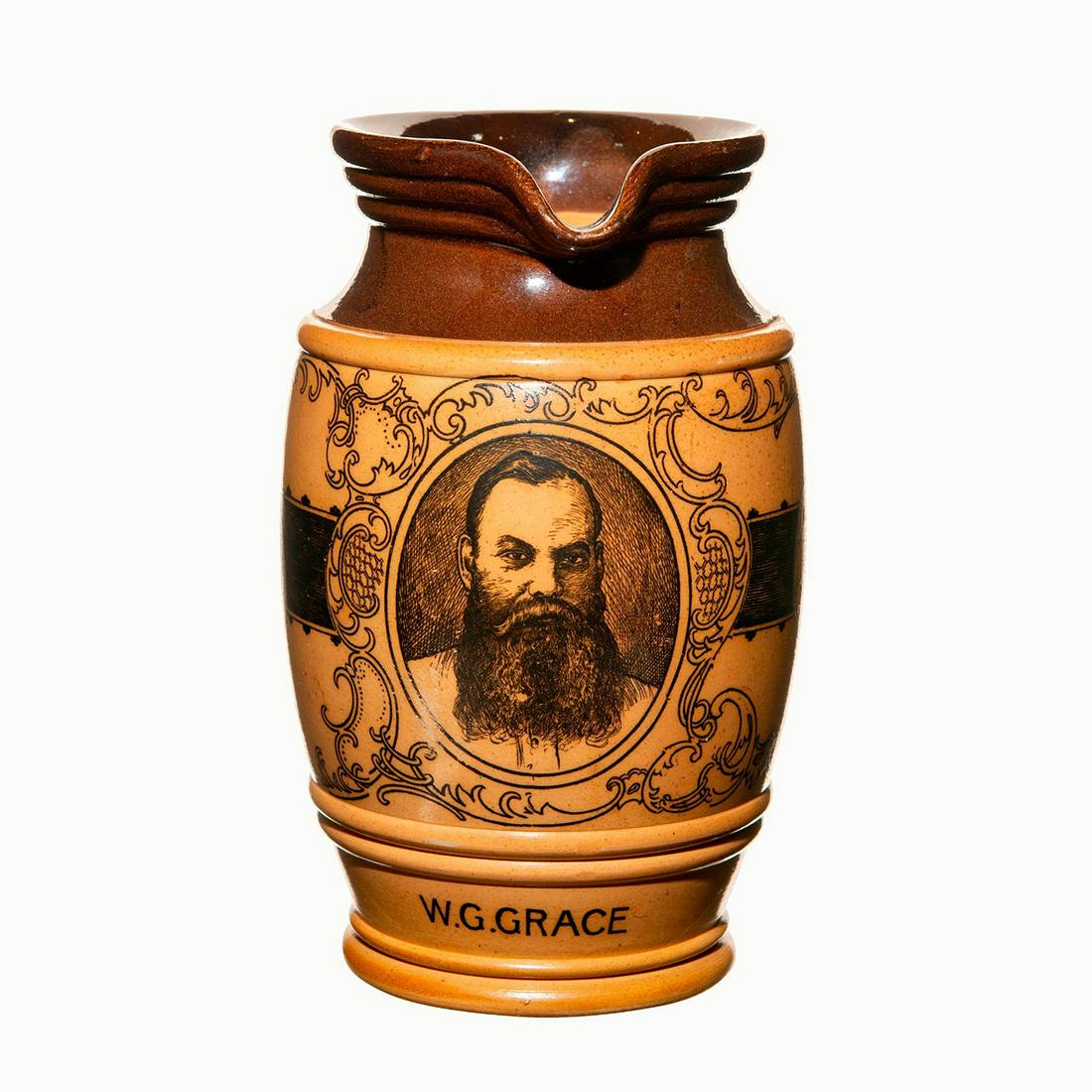 Doulton Lambeth Whiskey Water Presentation Pitcher of: W G Grace Interest: A Doulton Lambeth Two-Tone Salt Glaze Pottery Cricket Commemorative Jug, early 20th century, of ovoid form with ribbed neck in dark brown glaze and strap handle, printed with portr