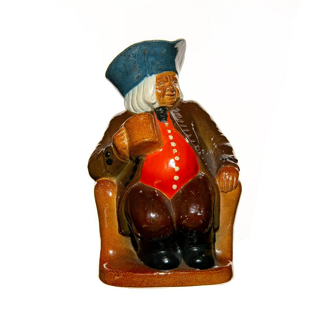 Rare Royal Doulton Simeon Armchair Toby, Sculptural: Rare Doulton figure of a seated man with mug. Bright orange vest and dark ochre coat. Doulton stamp. Issued: 20th c. Dimensions: 7.5"H Manufacturer: Royal Doulton Country of Origin: England Provenance