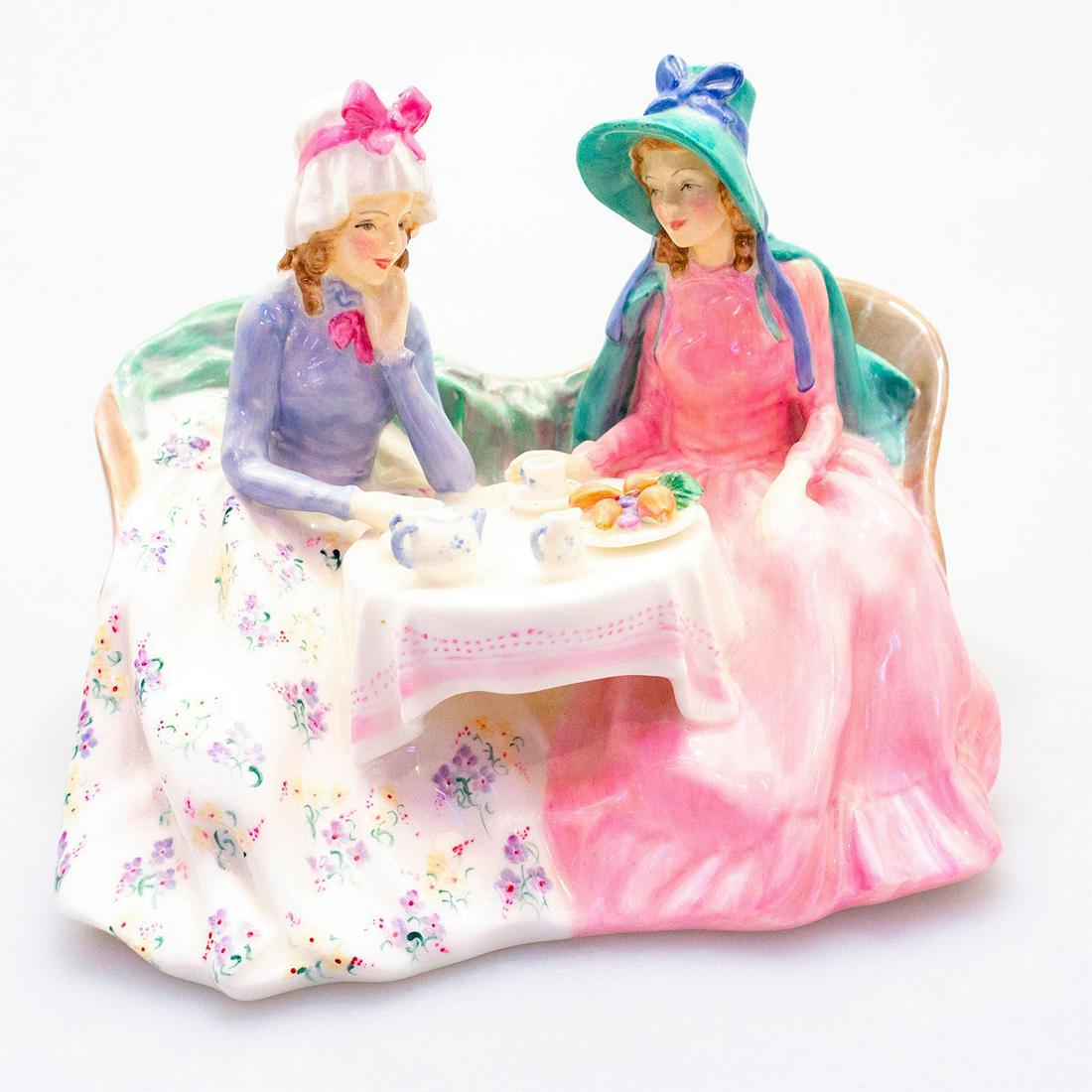 Afternoon Tea HN1747 - Royal Doulton Figurine: Royal Doulton backstamp. Bring home this age-old English tradition. Afternoon Tea features two ladies enjoying some tea and friendship. In a world where old fashioned values seems to be long gone, a t