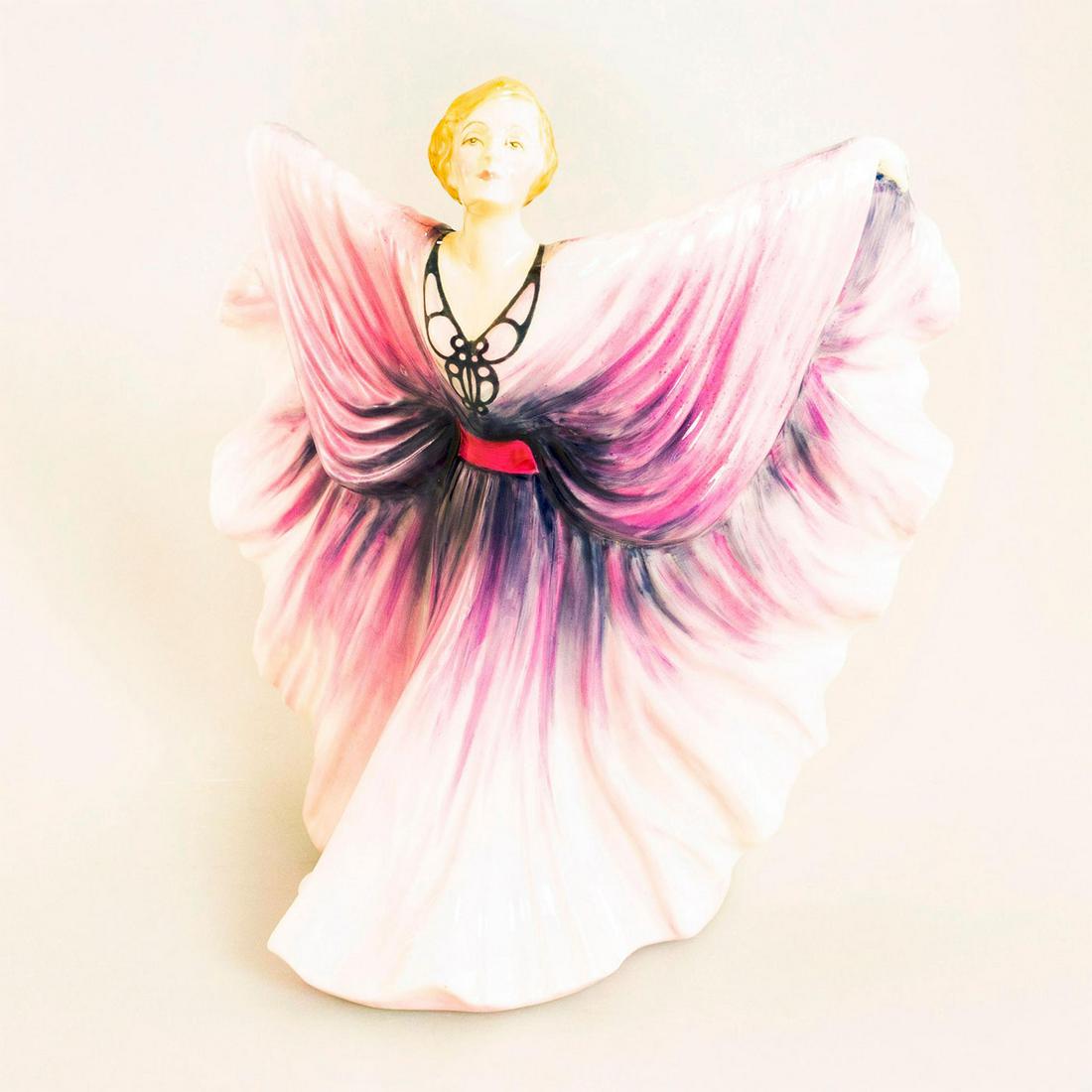 Isadora HN2938 - Royal Doulton Figurine: Glazed porcelain figurine; Woman in butterfly position; pinks and purples. Royal Doulton backstamp. Artist: Peter Gee Issued: 1986 - 1992 Dimensions: 8"H Manufacturer: Royal Doulton Country of Origin: