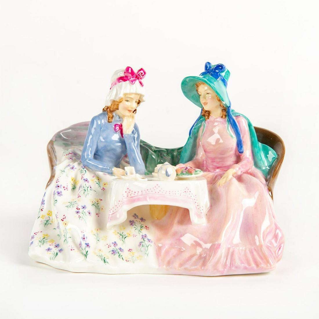 Royal Doulton Figural Group, Afternoon Tea HN1747: Harradine Classics. 2 ladies enjoying tea and friendship. Doulton backstamp. Broken cups and teapot spout. Artist: M. Railston Issued: 1935 - 1982 Dimensions: 6"H Manufacturer: Royal Doulton Country o