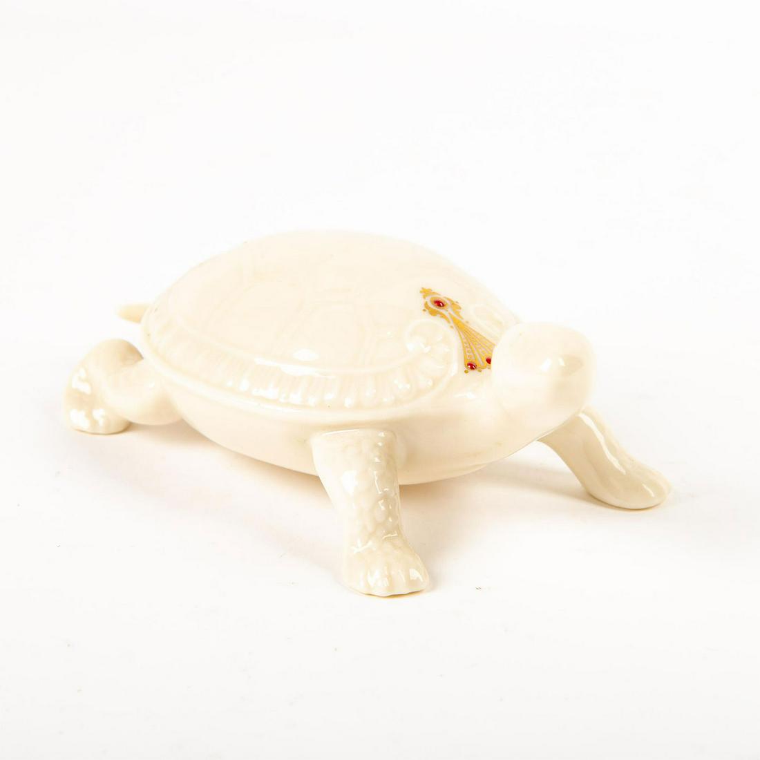 Lenox Porcelain, Turtle Figurine: Glossy porcelain figurine of a turtle from the Lenox China Jewels Collection. Lenox Backstamp. Issued: 1991 Dimensions: 1.75"H Manufacturer: Lenox Country of Origin: USA