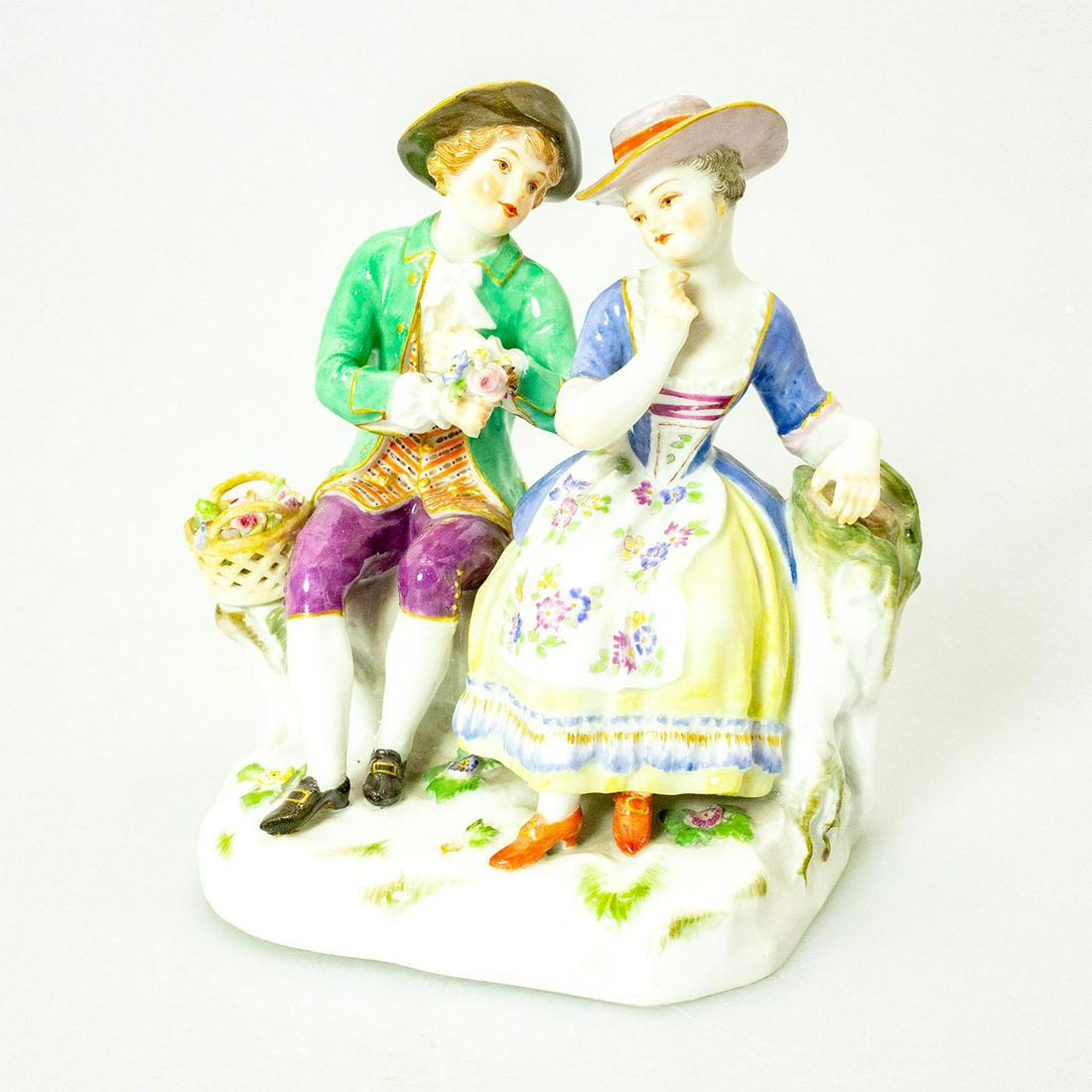 Vintage German-style Porcelain Figurine, Courting: A couple sits as the gentleman hands the lady flowers. Crossed swords mark on bottom. #vintageporcelain Issued: 20th c. Dimensions: 5.5"H