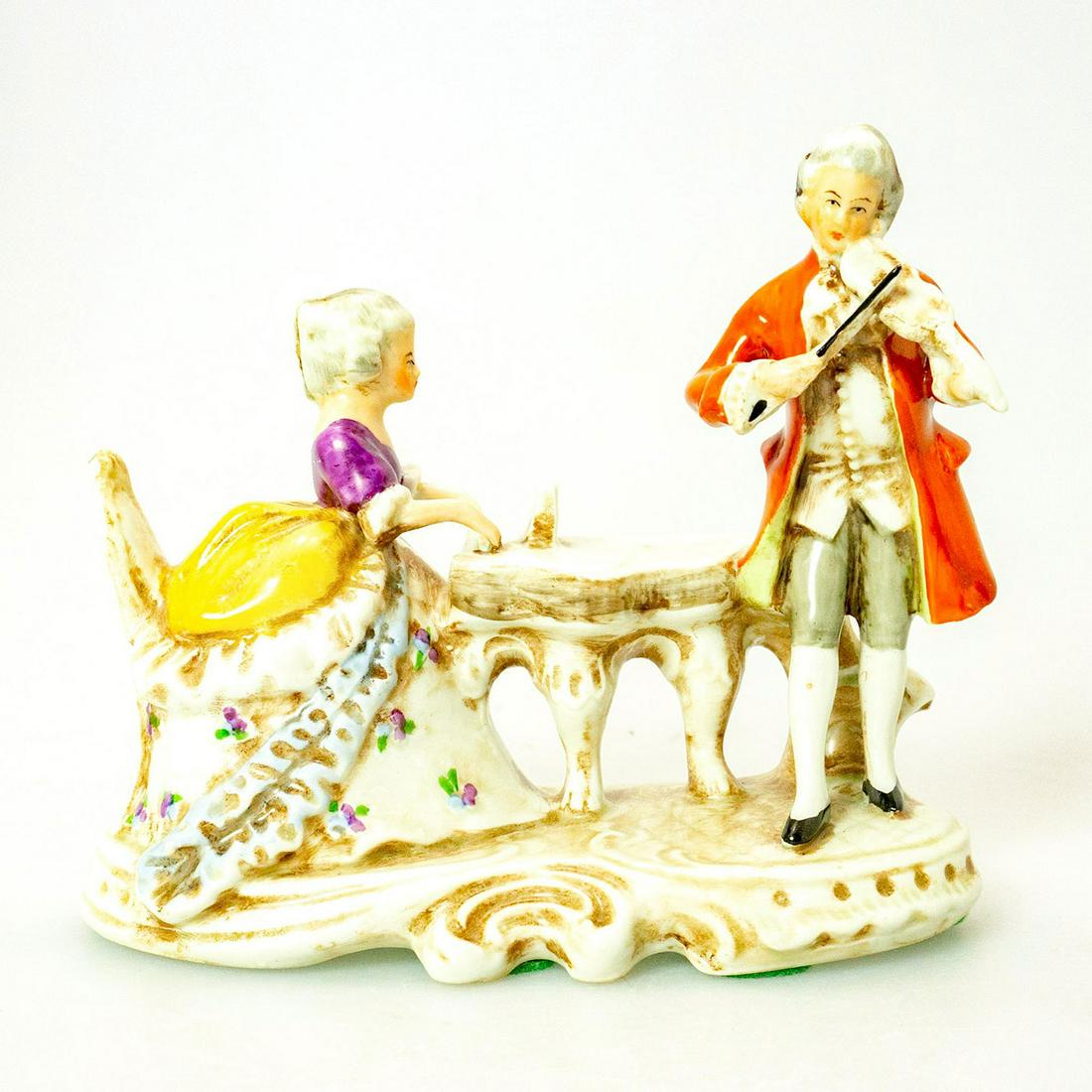 Vintage German-style Porcelain Figurine, Musical Couple: A lady sits playing the harpsichord while the gentleman plays the violin. #vintageporcelain Issued: 20th c. Dimensions: 5.5"H