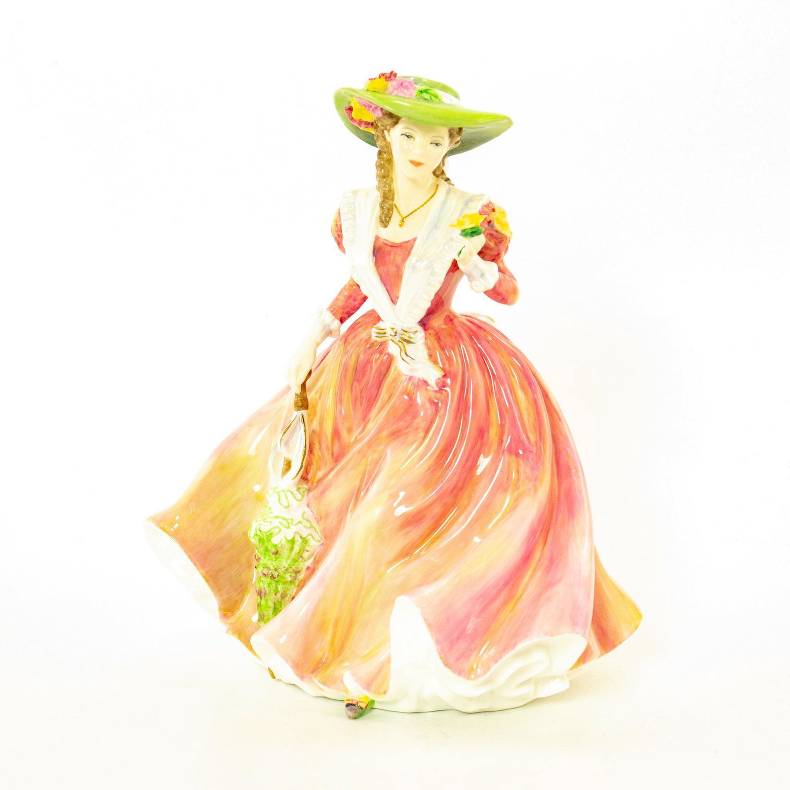 Marion HN5385 - Royal Doulton Figurine: Pretty Ladies Figure; From Nada With Love Collection. Limited edition of 800. Woman with parasol. Doulton marks on the underside. Chip to petal. Artist: Nada Pedley Issued: 2009 Dimensions: 8.5"H Edit