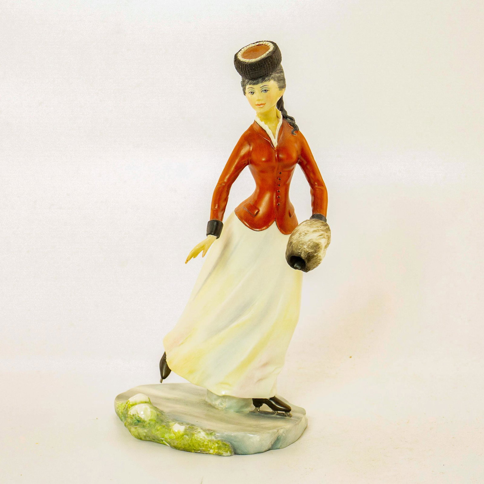 Emily - Royal Worcester Figurine: Emily skates in her festive red jacket and hat holding her muff. #royalworcester Issued: 1996 Dimensions: 8"H Manufacturer: Royal Worcester Country of Origin: England