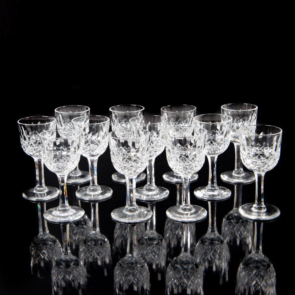 12pc Thomas Webb Normandy Crystal Cordial Glasses: Elegant hand-crafted cut crystal in Normandy pattern. Thomas Webb backstamp. Thomas Webb began his glass career in 1829, when he became a partner of the Wordsley Glassworks. Soon after, he also inheri