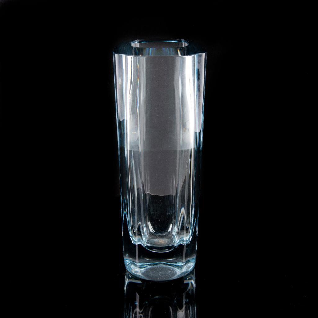 Vintage Strombergshyttan Swedish Art Glass Vase: Heavy, blown glass with Stromberg's signature blue tint and minimalist design. Etched Stromberg on the underside. Use related wear; scratches to base. Issued: 20th c. Dimensions: 11.25"H Manufacturer: