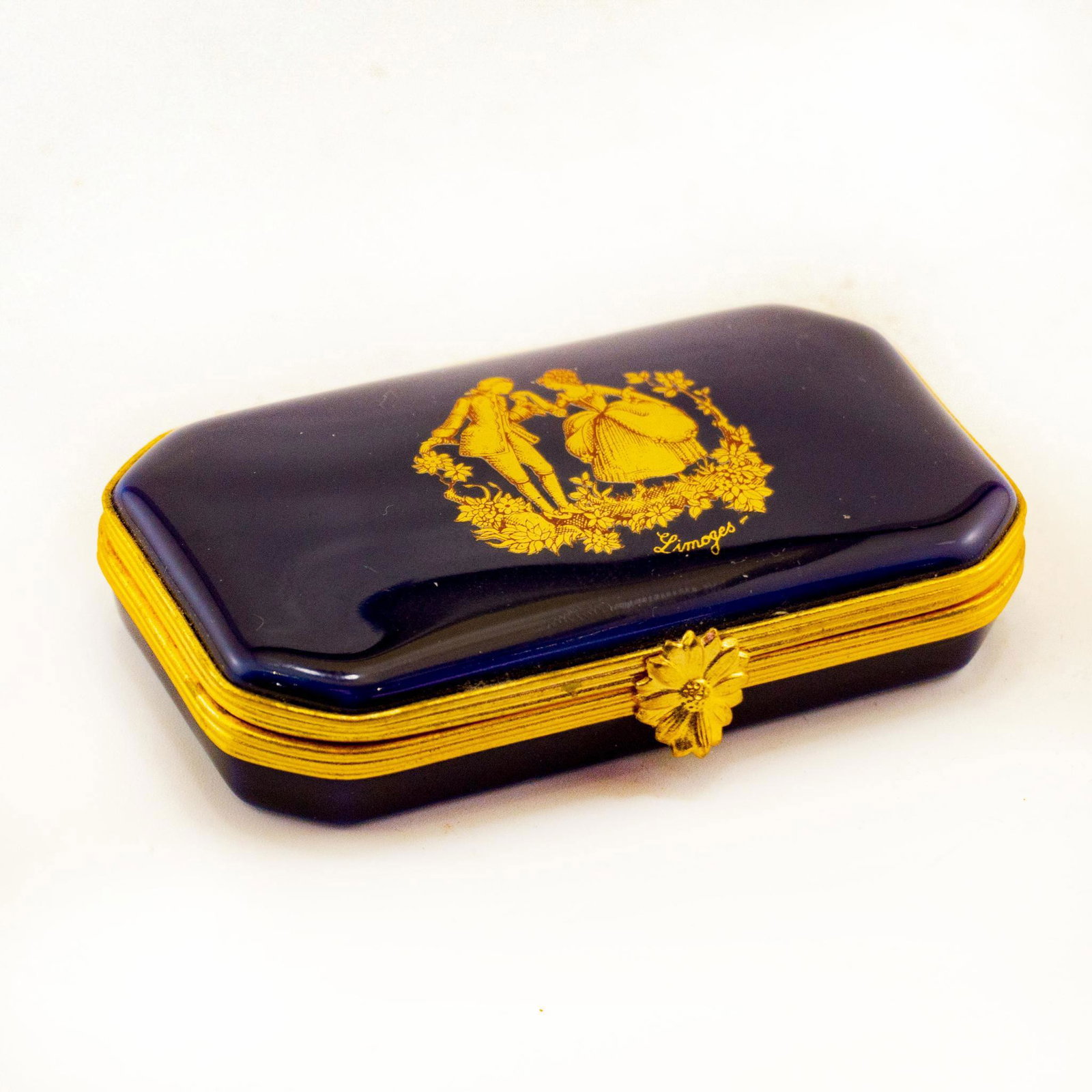 French Imperia Limoges Trinket Box, Victorian Couple: Small rectangular form; deep cobalt blue with extensive gilding. Limoges France backstamp. Issued: 20th c. Dimensions: 2.75"W Country of Origin: France