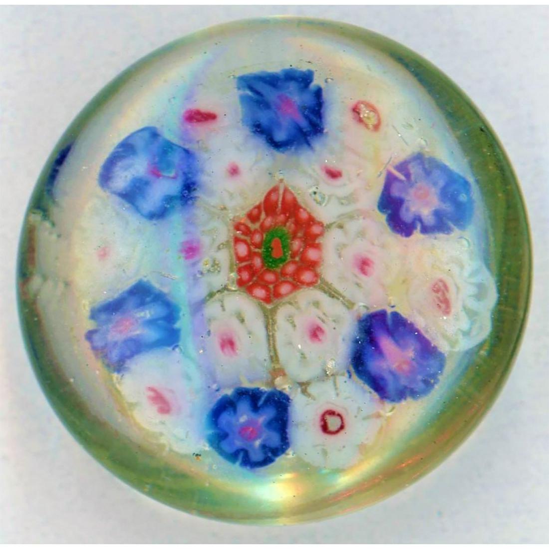 A CHINESE MILLEFIORE PAPERWEIGHT GLASS BUTTON: 1 LG. Chinese glass paperweight button with canes encased inside. This example comes from China and was made for the 1939 Worlds Fair and they were given as gifts to attendees. They are truly great la