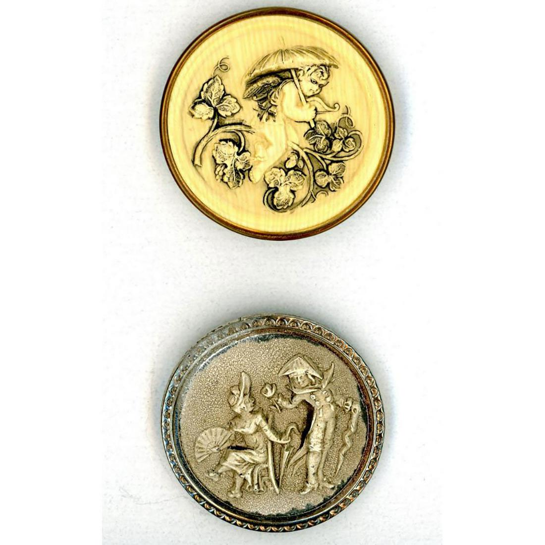 A SMALL CARD OF DIVISION ONE IVOROID PICTORIAL BUTTONS: 2 Large 19th century pictorial early celluloid buttons. Known as Ivoroid among collectors these high relief molded buttons date to the early 1870's when the first celluloid buttons were made. This lot