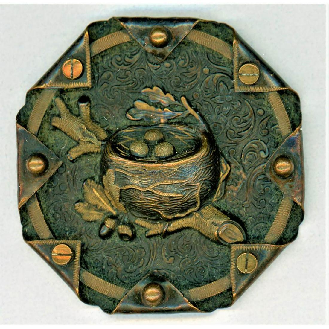 A SCARCE DIVISION 1 BRASS HANDKERCHIEF PICTORIAL BUTTON: 1 Extra large 19th century 8 corner handkerchief corner button. This is a beautifully detailed over 1 3/4" handkerchief corner button depicting a birds nest and eggs. A wonderful button for a border a
