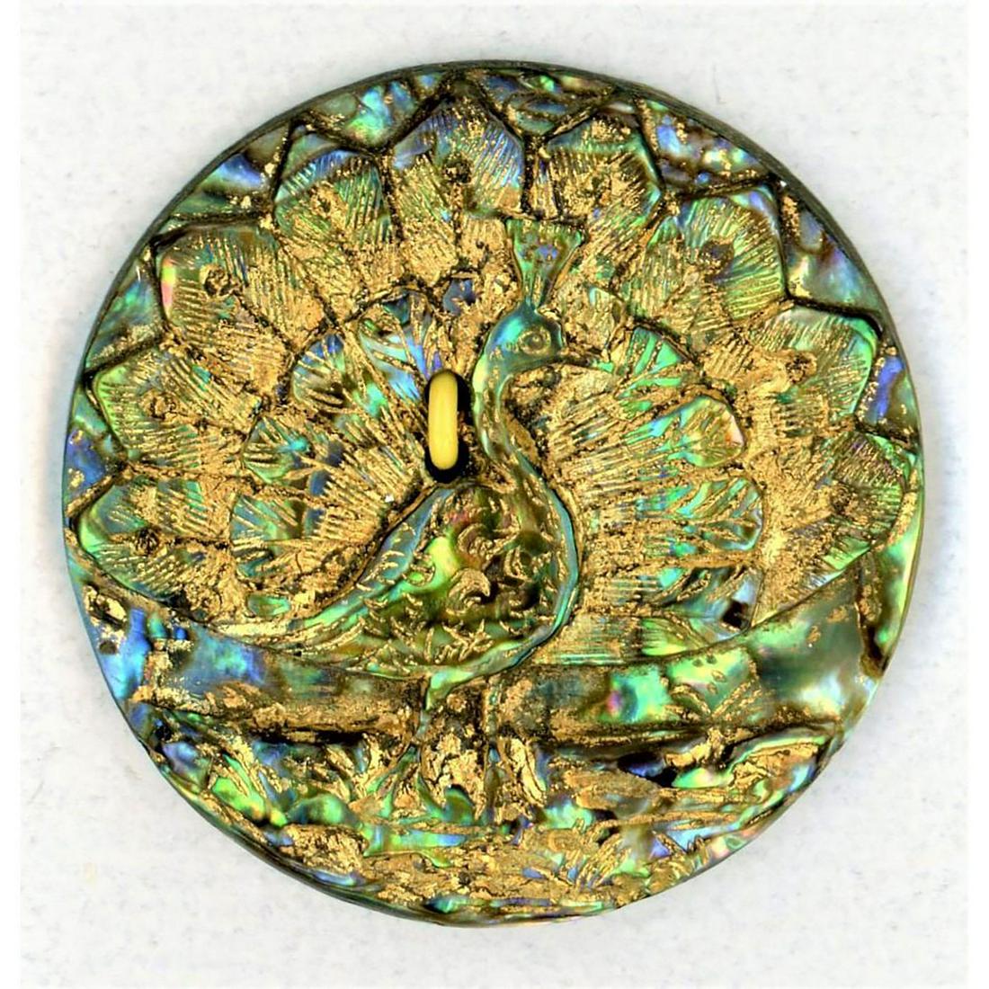 A RARE DIVISION ONE CARVED ABALONE SHELL PEACOCK BUTTON: 1 19th C. Medium very colorful carved full bodied Peacock button. This example has always been one of my favorite buttons when I got my button it in my grandmothers collection. The Peacock is so well