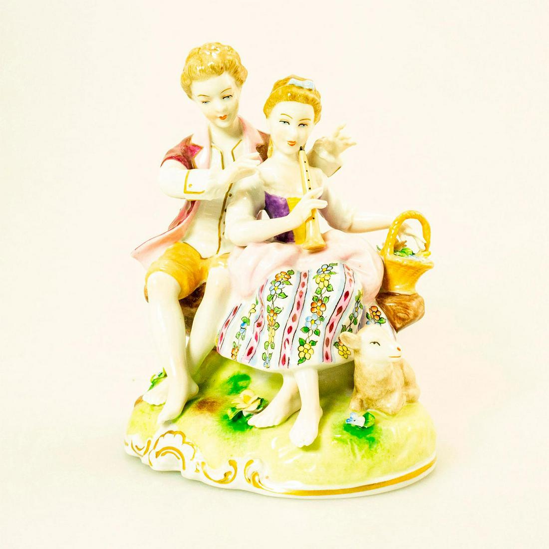 Unterweissbach Figurine Grouping, Shepherd and: Hand painted porcelain; Young shepherd and shepherdess with flute and lamb by their feet. Stunning coloration; finely painted details; high gloss glaze with gilt highlights. Unterweissbach backstamp.