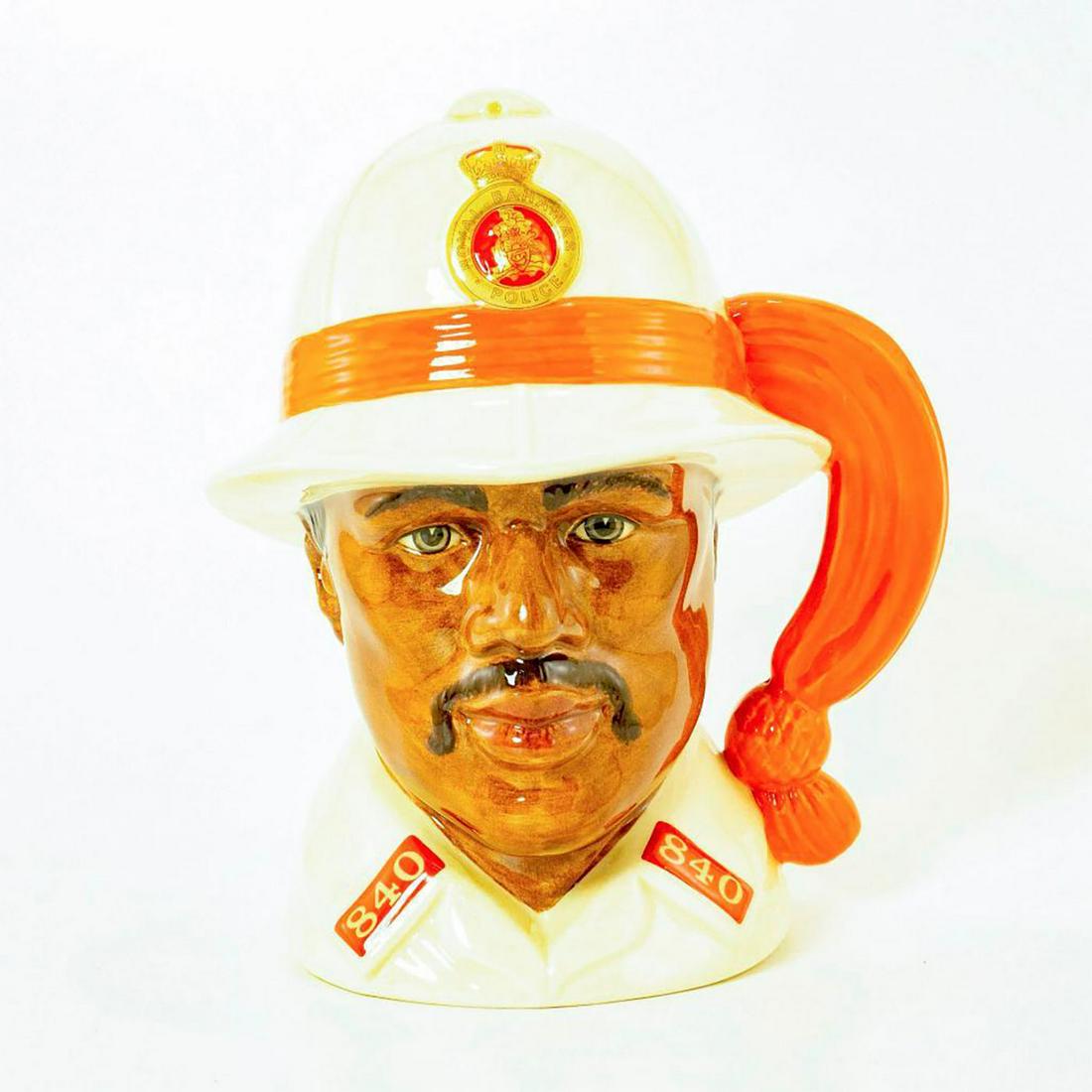Bahamas Policeman D6912 - Large - Royal Doulton: Commissioned by Island Galleria, Nassau, Bahamas. Royal Doulton Character Jug, Bahamas Policeman D6912 (white and red coloration). Designed by William K. Harper. Issued 1992 in special edition of 1,00