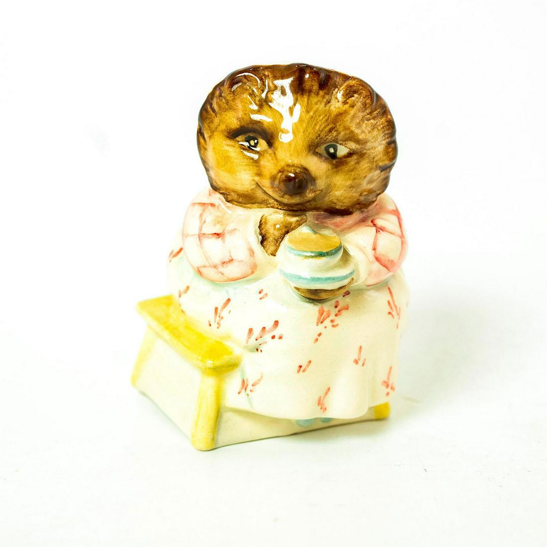 Mrs. Tiggy Winkle Takes Tea - Beswick - Beatrix Potter: Beswick Backstamp. Pink and white dress, white and brown mob cap. Artist: David Lyttleton Issued: 1985 - 2002 Dimensions: 3.25''H Country of Origin: England Manufacturer: Beswick