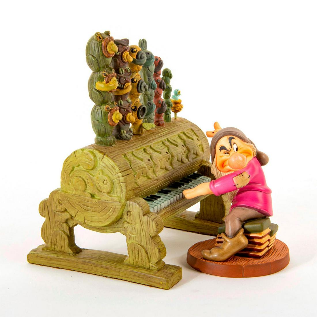 Disney Classics Figurine, Grumpy and Pipe Organ, Humph: Grumpy playing his intricate pipe organ. Includes original box. Includes certificate. Issued: 2004 Dimensions: 4.5"H Country of Origin: Thailand Manufacturer: Disney