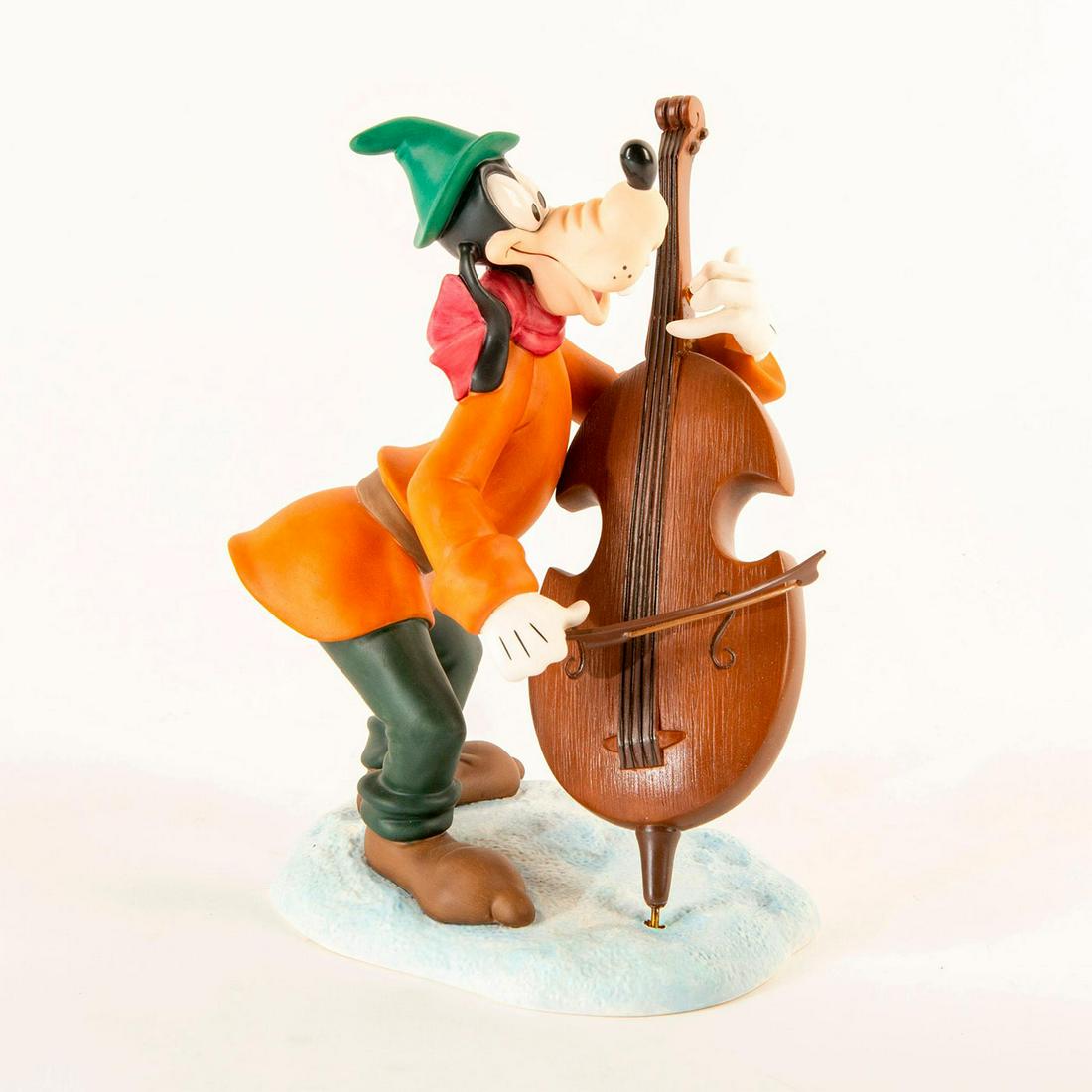 Disney Figurine, Goofy; Tis The Season To Be Jolly: Matte finished figurine; Goofy with Green Pants, Orange shirt and Hat. With Box Certificate Included. Dimensions: 8"H Country of Origin: Taiwan Manufacturer: Disney