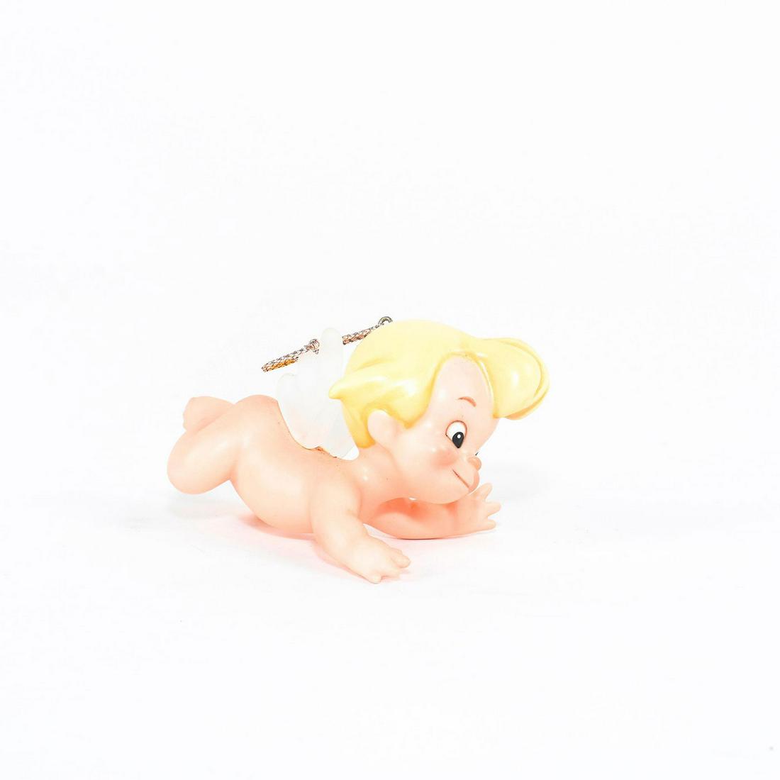 Walt Disney Classics Ornament, Cupid, Fantasia: Delicate Cupid in mid-flight with glass wings. Porcelain ornament, Cupid, Flights of Fancy, from Disney's 'Fantasia'. Dimensions: 2"H Country of Origin: Thailand Manufacturer: Disney