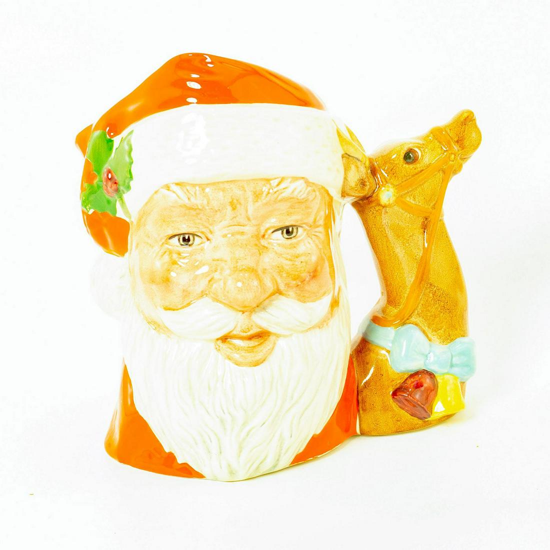Santa Claus Reindeer D6675 - Large - Royal Doulton: Santa Claus Red with Reindeer handle with red, white and brown coloration. The Santa Claus jug was introduced in 1981 and was the first to undergo annual design changes. Featuring different well-known