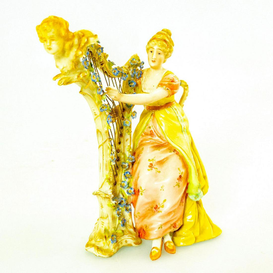 Vintage Porcelain Lady Figurine, Harpist: Woman playing a harp. Hand painted design; intricate floral design; gilt accents. Restoration to harp; fade to glaze and gilt. Issued: 20th c. Dimensions: 5.25"H