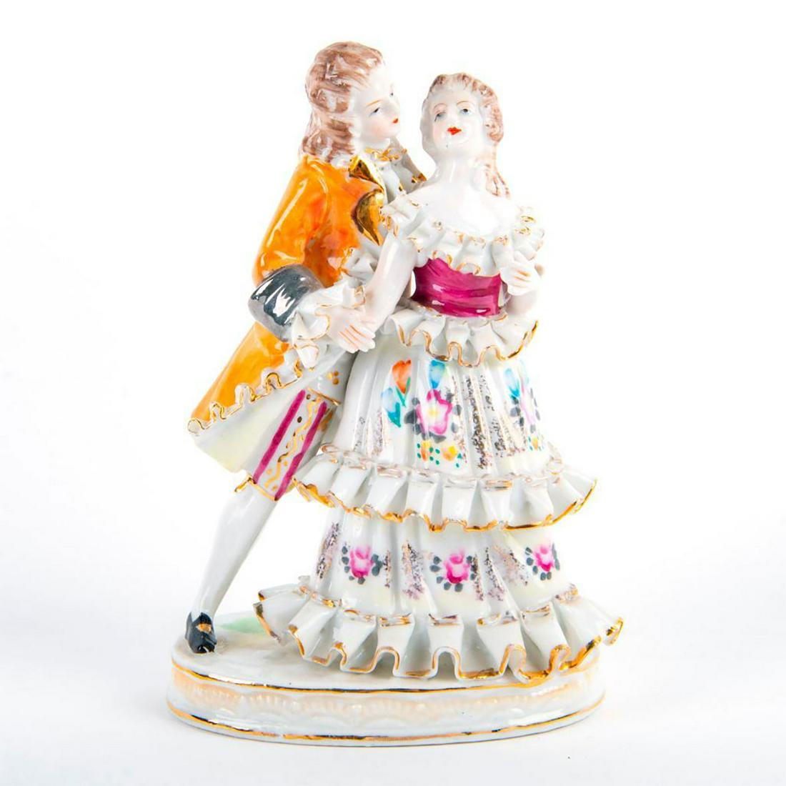 Vintage German-style Bone China Figurine, Courting: Elegantly dressed couple mid-embrace with gilt decoration throughout. Crossed swords mark on bottom. #vintageporcelain Issued: 20th c. Dimensions: 6.5"H