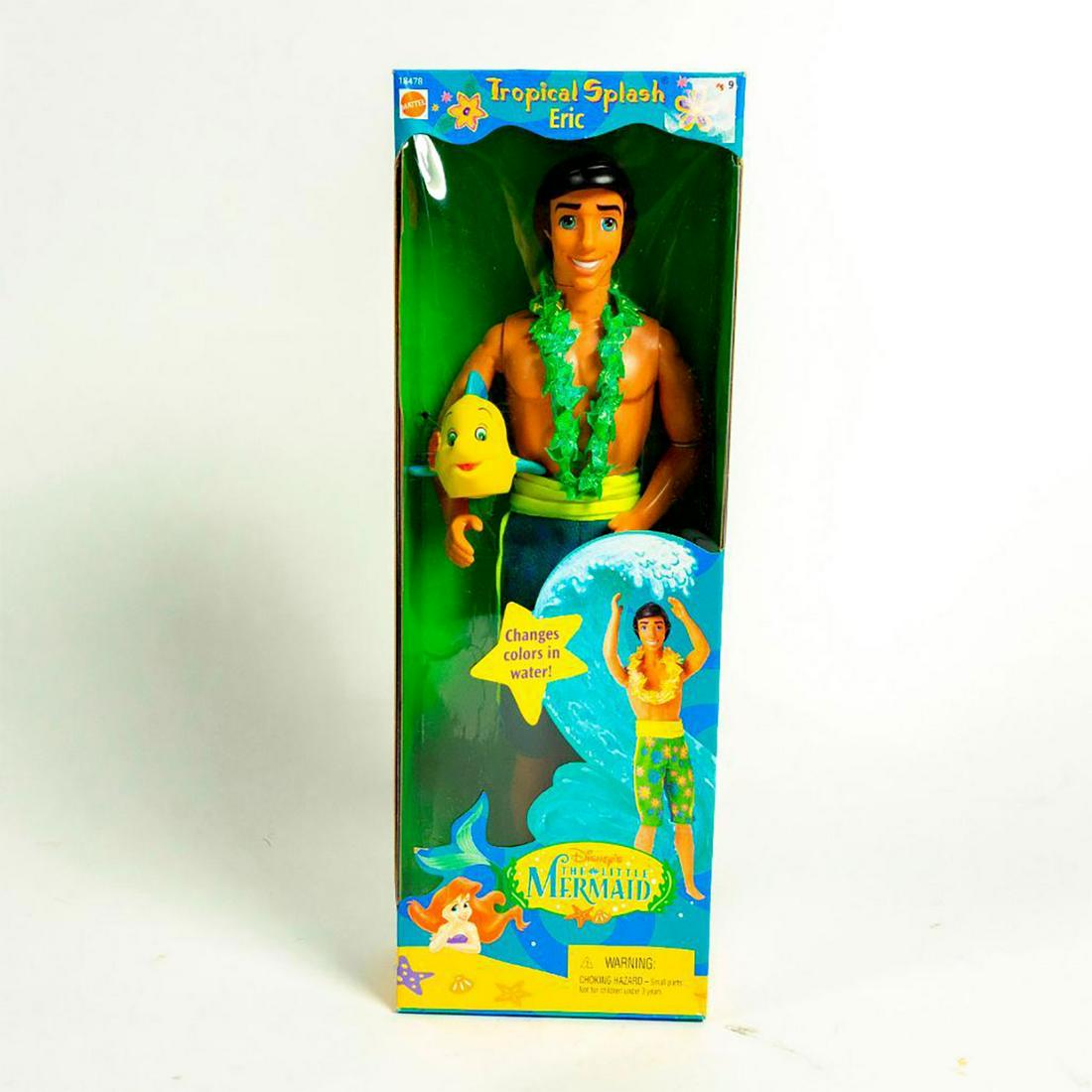 Disney's The Little Mermaid Tropical Splash Eric Doll: Tropical mermaid Prince Eric doll, green and yellow shorts; includes Flounder. Changes color in water! With original box. #princeericbarbie SKU #18478 Issued: 1997 Dimensions: 11"H Manufacturer: Matte