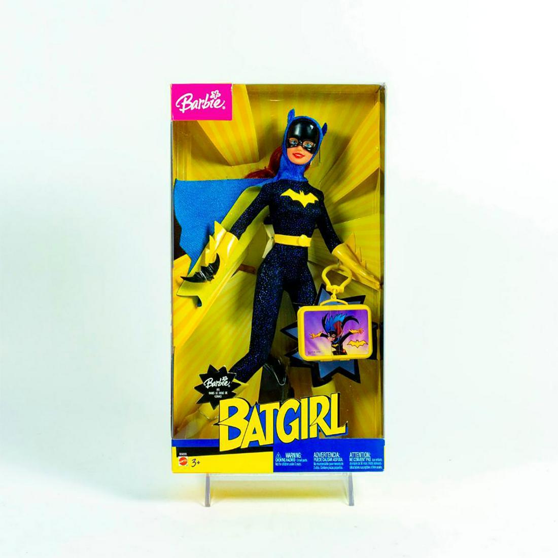 Barbie Doll as Batgirl: Classic DC Comics character in a black bodysuit with blue dots, mask, yellow boots and gloves. SKU #B5835 #B5834. #batgirl #barbie #dccomics Issued: 21st c. Dimensions: 12"H Manufacturer: Mattel Count