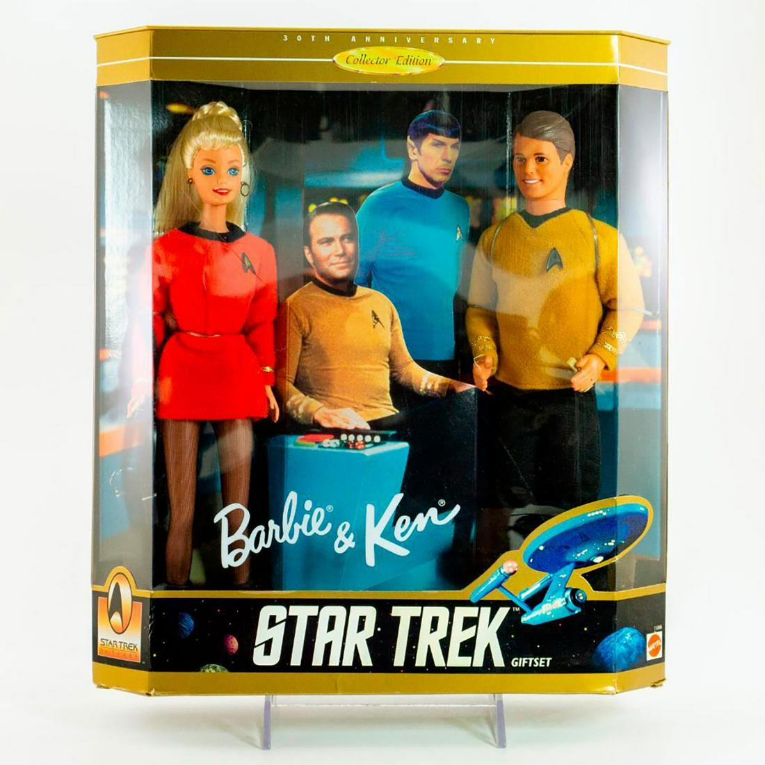 Mattel, Barbie and Ken Star Trek Gift Set: Barbie is red dress with black trim, black shoes. Ken in gold shirt with black trim, black pants. With original, unopened box. Issued: 1996 Dimensions: 13"H Manufacturer: Mattel Country of Origin: Ind