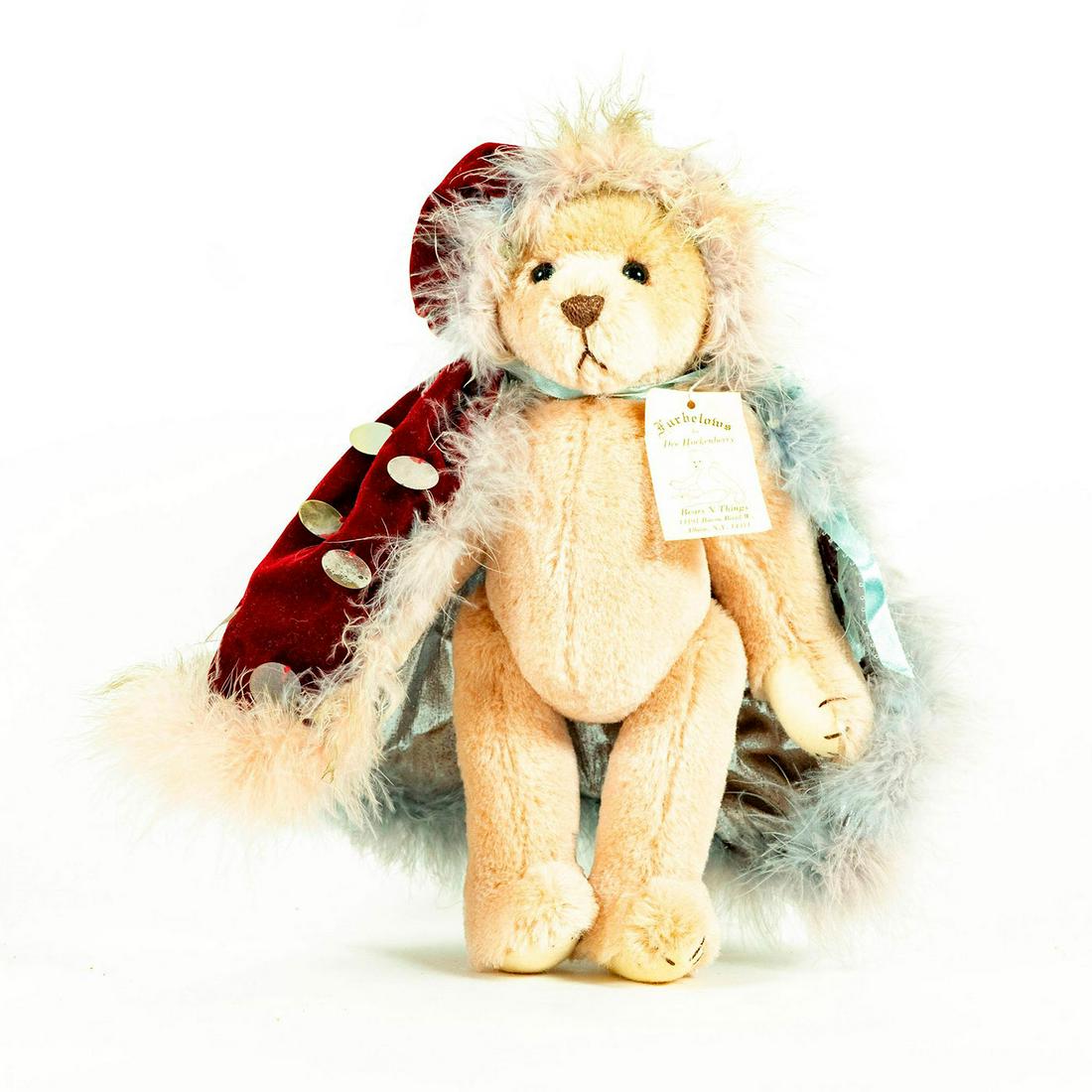 Furbelows Bear, Puff: Light pink bear; Red and silver dotted cape. Pink fur lining. Artist: Dee Hockenberry Issued: 20th c. Dimensions: 14"H Manufacturer: Furbelows Country of Origin: USA