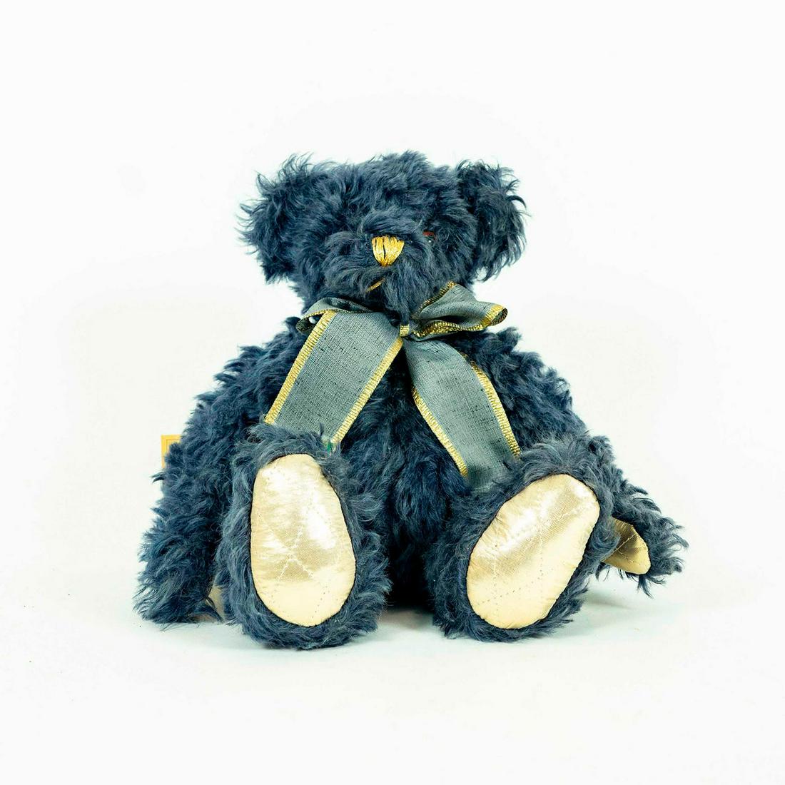 Hermann Annual Bear, Golden Blue, 1997: Collectors bear. Mohair; polyester fiber filled; glass eyes. Includes original tag. Issued: 1997 Dimensions: 12"H Manufacturer: Hermann Country of Origin: Germany