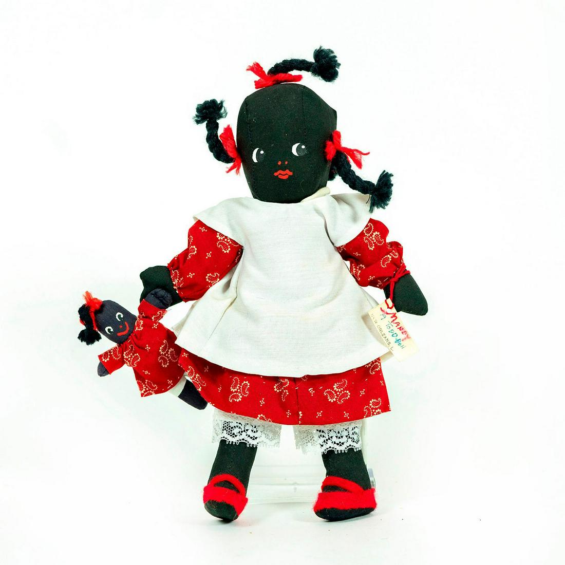 Vintage Doll, A Todd Doll, Mandy: Hand crafted doll with mirrored doll in hand. Wearing read paisley patterned dress. Original label attached to right hand. Artist: Eleanor Todd Issued: 20th c. Dimensions: 10"H Manufacturer: A Todd Do