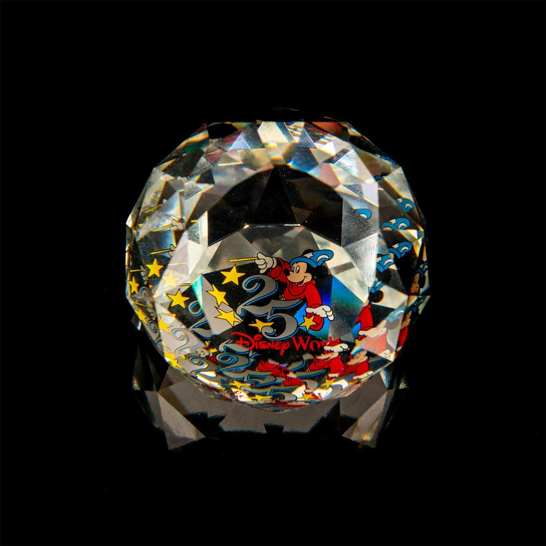 Swarovski Crystal Disney Paperweight, Walt Disney World: Faceted clear crystal ball form features Mickey Mouse. Marked Disney. Includes box. Issued: 20th c. Dimensions: 1.75"H Manufacturer: Swarovski Country of Origin: Austria